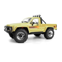 Venture18 Flux 1985 Toyota Hilux SR5 - Creme (T)